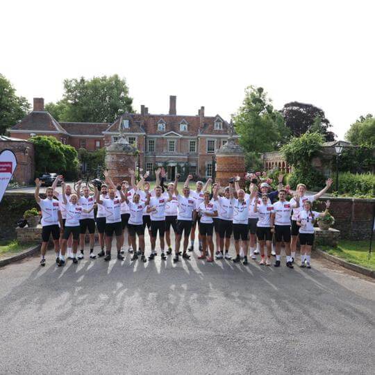 “Pedals - Hospitality Action Summer Cycle Challenge participants cycling in countryside”